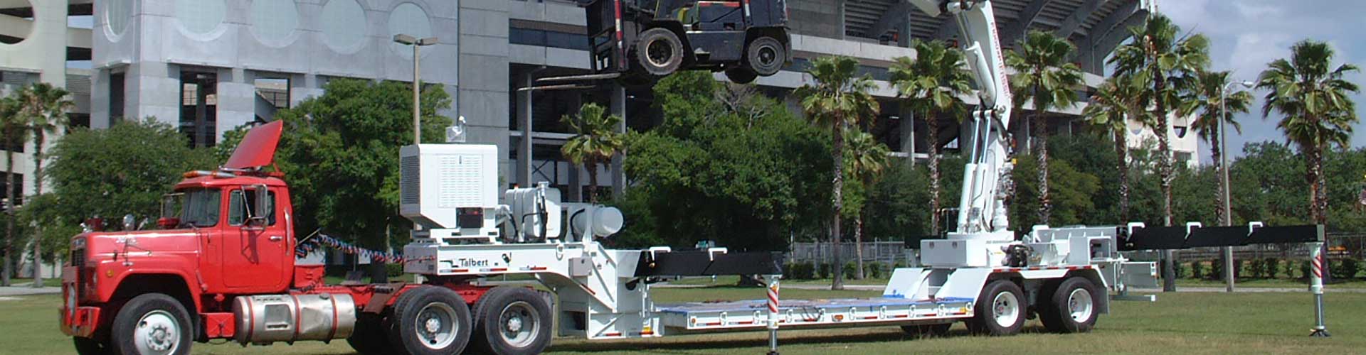 Crane Picking Up Forklift