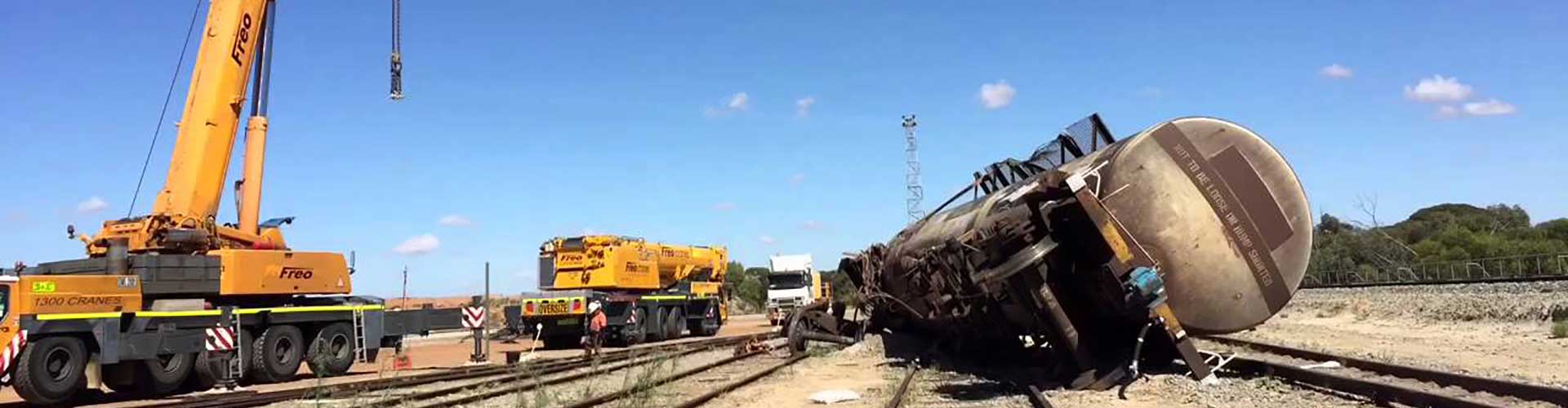 Crane Picking Up Train